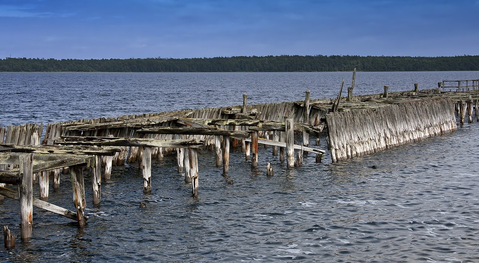 Damaged pier in the water