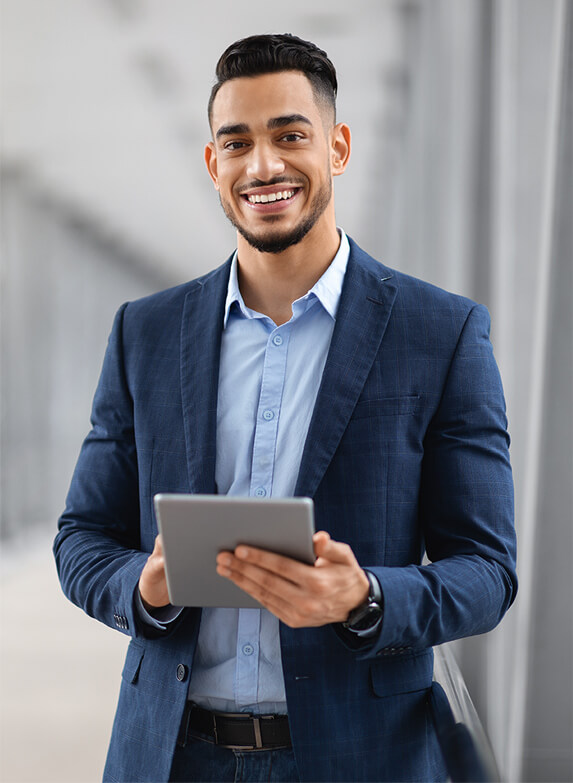 Man in suit with tablet