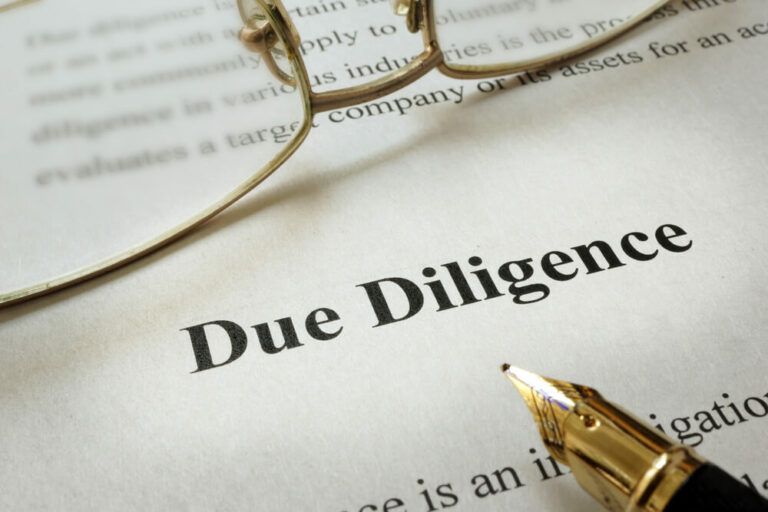 Due diligence document with a fountain pen to sign